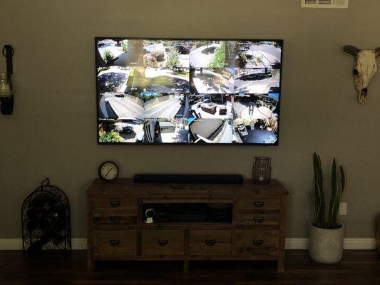 16 4K IP Cameras displayed on 70 inch TV in a clients living room! We have custom solutions available for any size home or business!