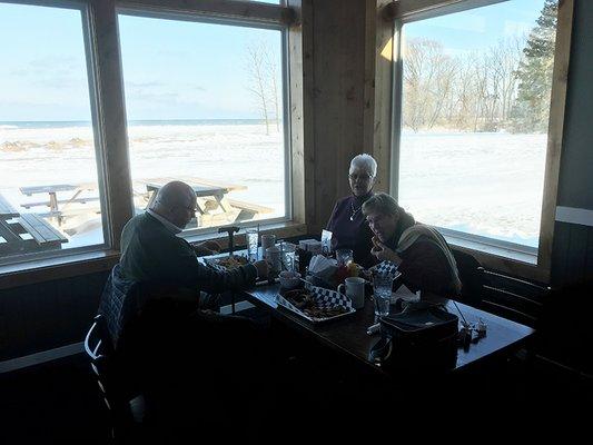 Beyond the snow covered lawn you can see Lake Huron