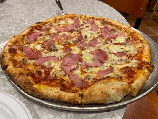 Large meat special pizza.