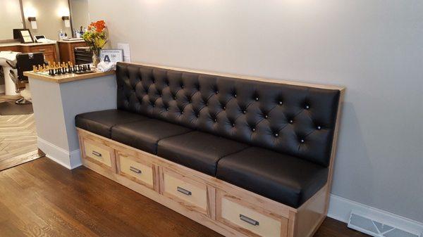 Waiting area with nice black leather seating