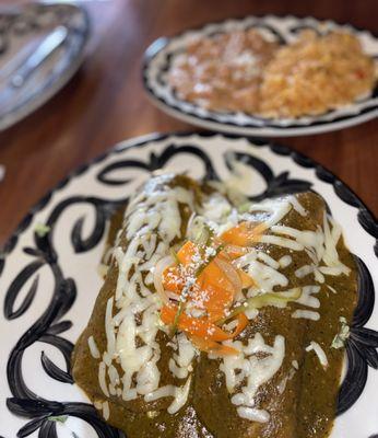 Enchiladas Verdes w/ beans and rice.