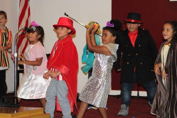 Campers show off their moves during a summer performance.