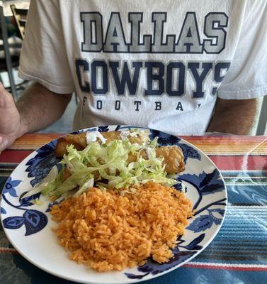 Lunch portion chicken flautas. Extra rice.