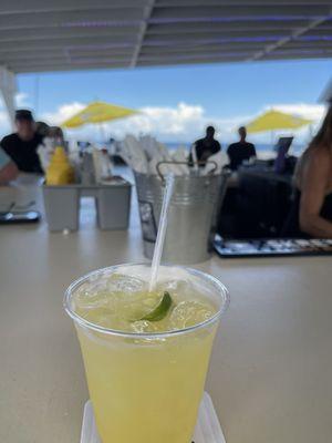 Patron margarita with a beautiful beach view