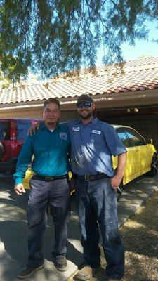 Elite Rooter technicians standing together, showcasing teamwork and dedication to delivering reliable plumbing services.