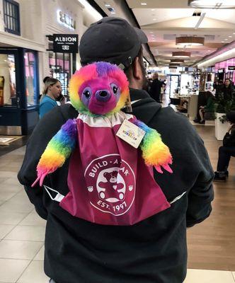 Carrying my daughter's Rainbow Sloth, Slola!