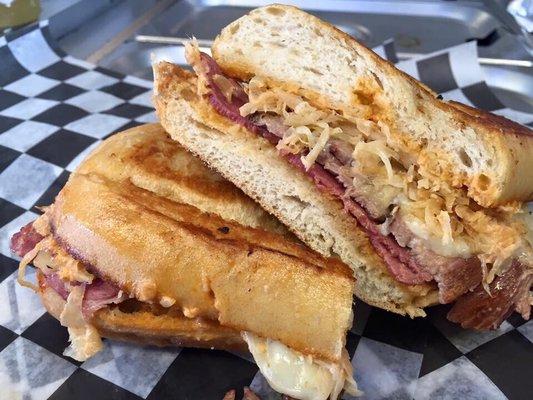 Smokin' Reuben Cuban sauerkraut, corned beef, smoked pork, Swiss cheese, Russian dressing!