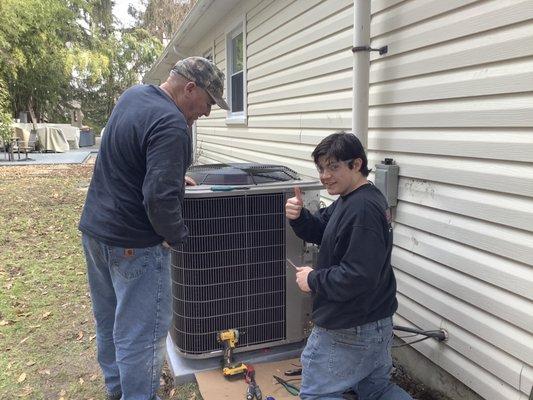 Ben wiring the outdoor unit.