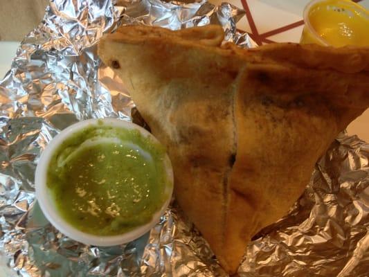 $1.75 samosa with chutney, very good.