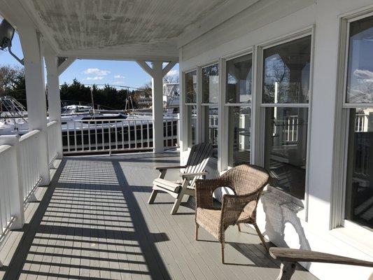 Guests can enjoy cocktail hour outside on the porch