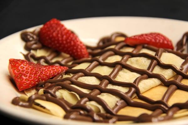 Parisian crepes - served with your choice of granulated sugar, lemon, raspberry puree or nutella hazelnut chocolate