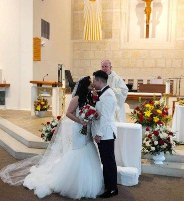 our beautiful flower arrangements for the ceremony, my bride bouquet and his boutonniere. #FirstKissAsHusbandWife