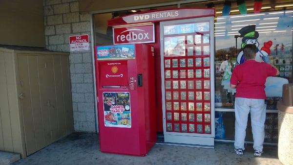 Redbox and a lady painting a snowman..