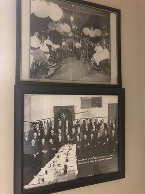 This is the original barbershop. And a picture of the old barbers from that time Mr Wardens Sr. Is in bottom row 3rd from left