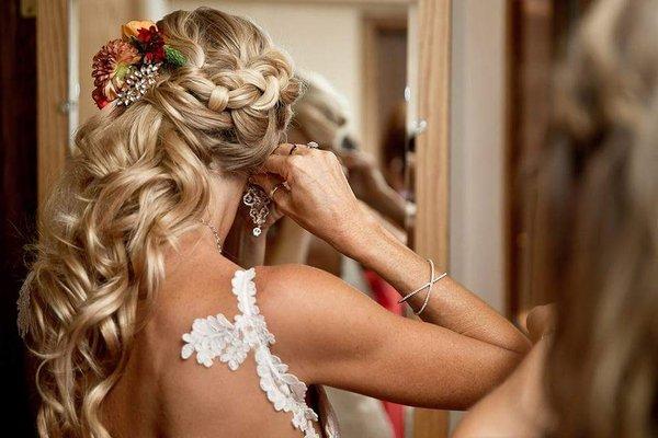 Wedding day hair for your whole bridal party. check out out portfolio at www.sorellasteamboat.com