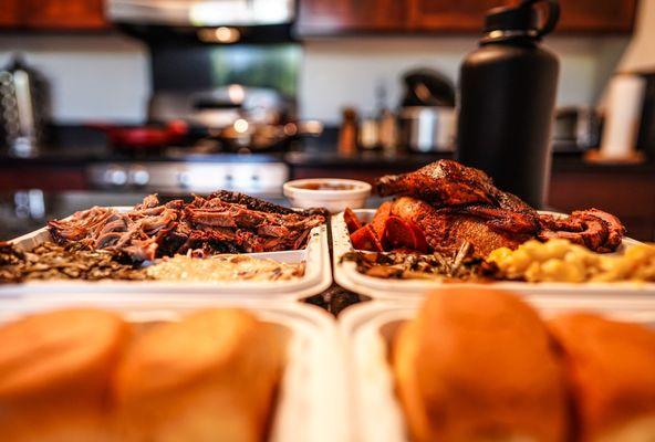 Two three-meat plates with collards, mac, and slaw