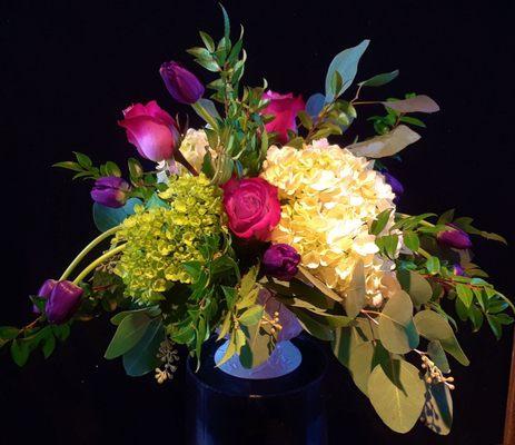 Invite some Spring into your home early with one of our lovely floral creations-green and white hydrangea, lavender, roses and purple tulips