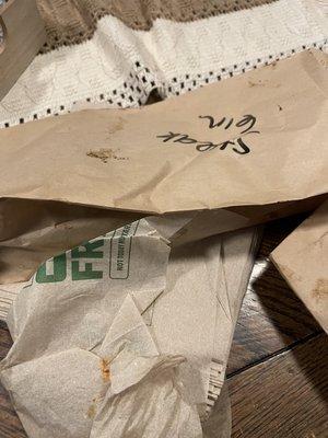 Dirty bags that the sandwiches were placed in