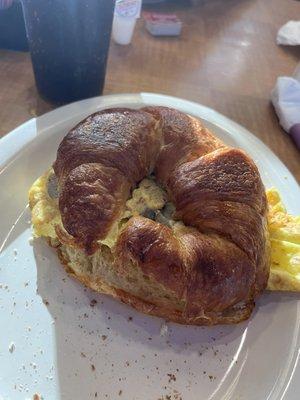 Sausage egg and cheese on a croissant