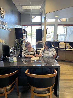 Welcome to our office! Claudia and Rosario are our wonderful front desk staff that are happy to help you!