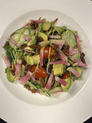 Zucchini noodle salad with avocado drizzle