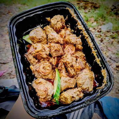 Rendang Beef for $27. Coconut milk & curry spices are prevalent. Beef is very tender. I tried it, but can't say I'd order it again.