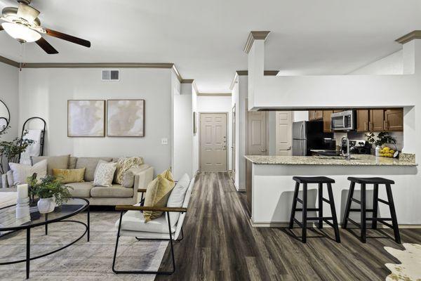 Living room with view of kitchen at Mira Vista at La Cantera