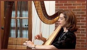 Lisa Handman of Harpnotes with a beautiful hand carved Acoustic Pedal Harp