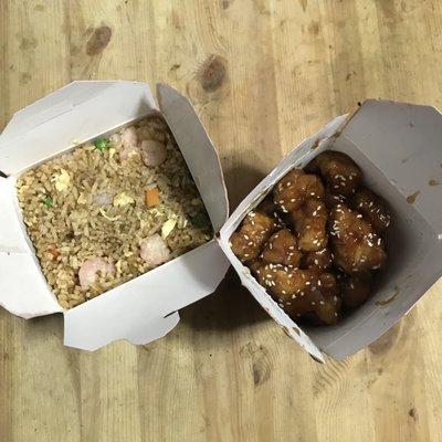 Shrimp fried rice and sesame chicken takeout.