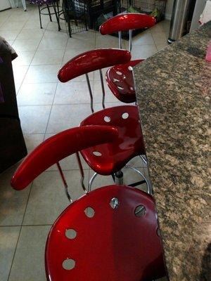 Wine red tractor barstool from Desks Galore