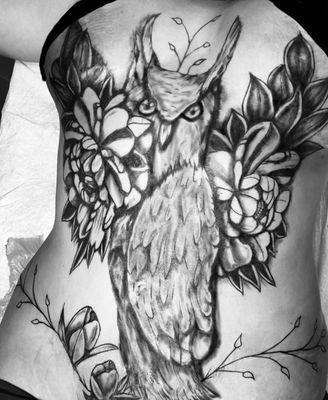 "Stunning black and gray peonies and owl tattoo, custom-created from lower waist to chest, a masterpiece of frontal body art."