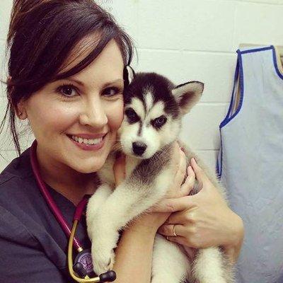 Kimberly, with one of our adorable puppy patients