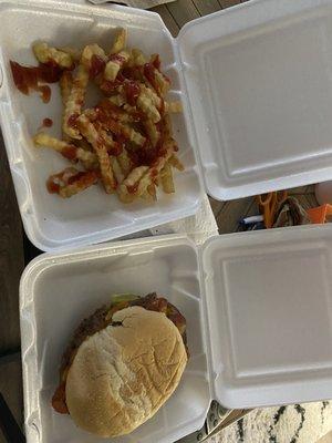 Double Cheddar Bacon Double Burger (1/2lb) and fries.