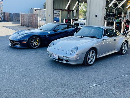 A couple of nice cars getting coated.