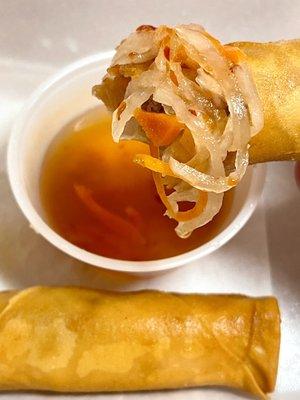 Egg Rolls (2 pcs) with carrot sauce for dipping, lots of carrots and cabbage in the sauce, nice not too sweet - takeout