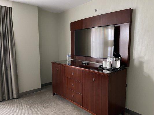 Flat-panel television and bureau inside my room at The Westin Book Cadillac Detroit.