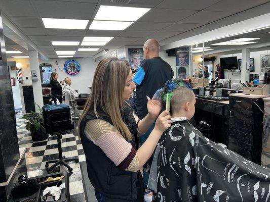 Sommer and my son. This is a family barbershop like the ones we grew up with back in the day.