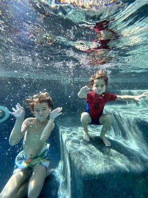 Two superhero swimmers enjoying their swim class and underwater photo shoot :)