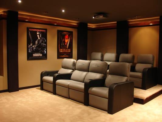 Harley Theater with Infocus projector, 110" Stewart Filmscreen, B &W Speakers with Fortress Seating and custom acoustical panels