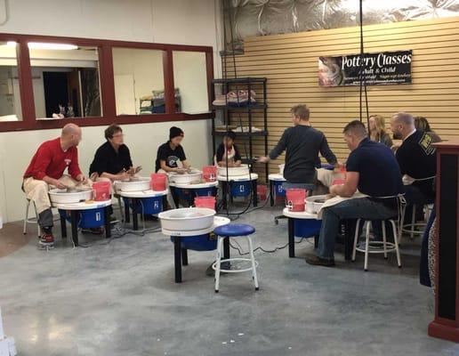 Learn to make pots with clay on the pottery wheel in one of our classes.