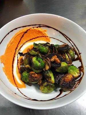 Brussel sprouts, romesco, pickled red onion, toasted walnuts, balsamic reduction. Image source from Facebook page.