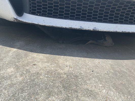 This is the front bottom of the car he ripped off because he didn't complete unhook the car