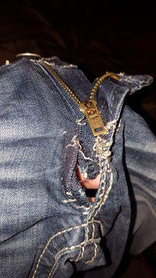 Zipper replacement not fixed where stitches were removed.