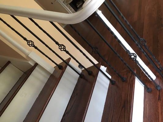 Balusters installed by alexander floors along with refinished hardwood