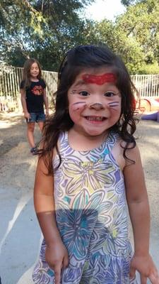 My favorite little princess extremely happy and excited to show mommy and daddy her face paint!