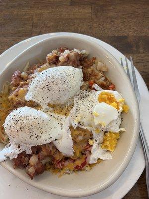 Mushy Corned Beef Hash with hard cooked poached eggs.