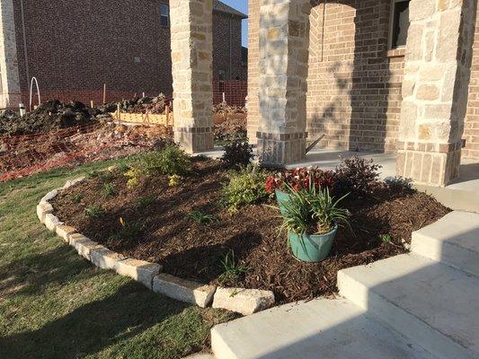 Flowerbed and edging for a new custom home!