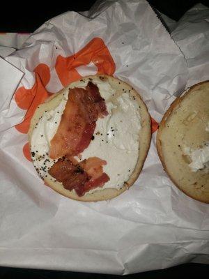 A bagel with cream cheese and bacon mind you I asked for extra cream cheese how they gave one peice of bacon though