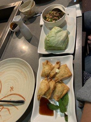 Chicken lettuce wraps (top) and Thai Style Crab Rangoon (bottom)