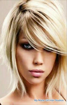 Beautiful blonde bob with razored layers and fringe